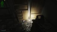The first journal spawns in between the two shelves (Image via Battlestate Games)